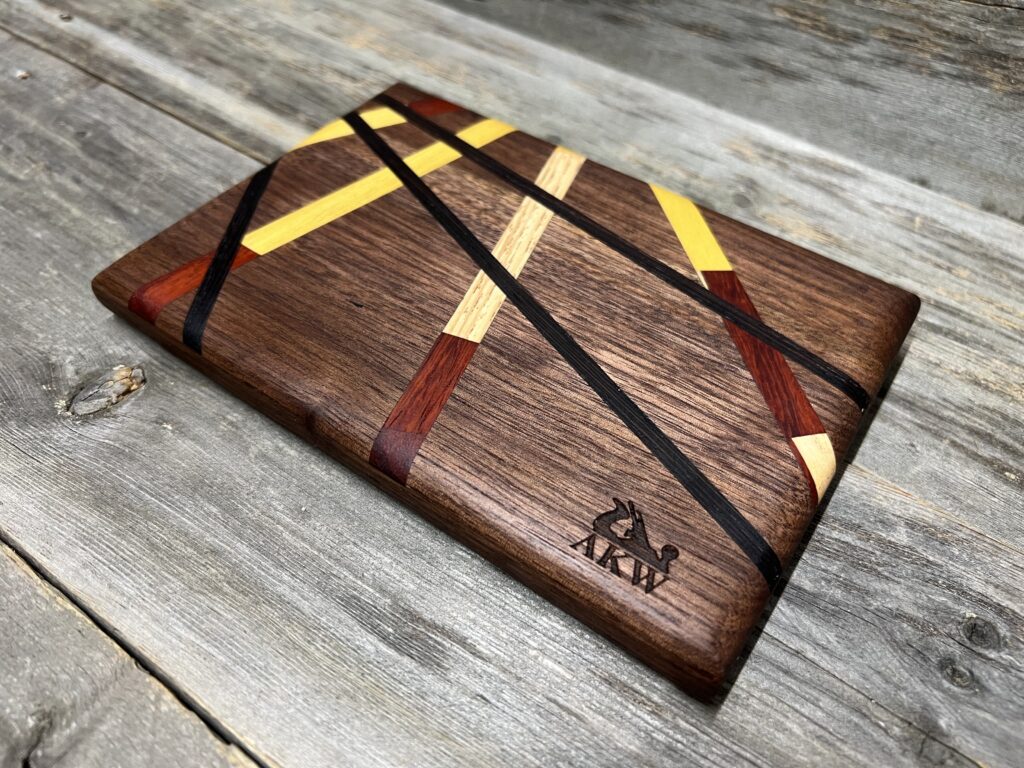 Chef Petite Cutting Board - Walnut with Yellow, Red, and Black Geometric Inlay