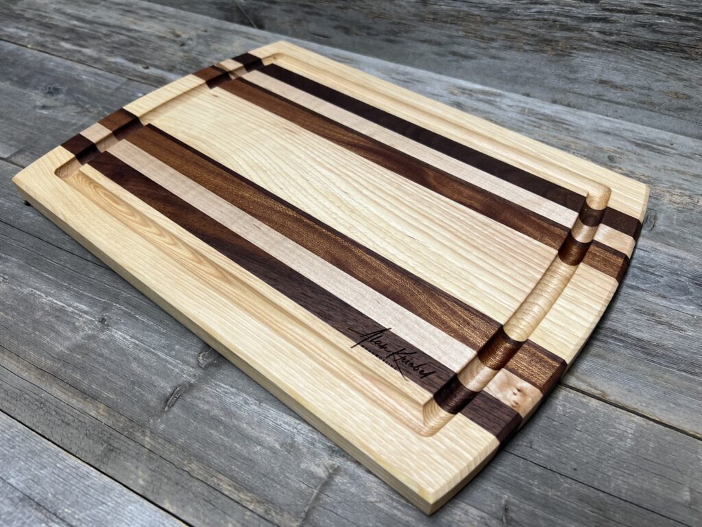 Handcrafted Hickory, Walnut, Maple, and Sapele Cutting Board