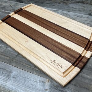 Handcrafted Maple, Walnut, and Sapele Cutting Board